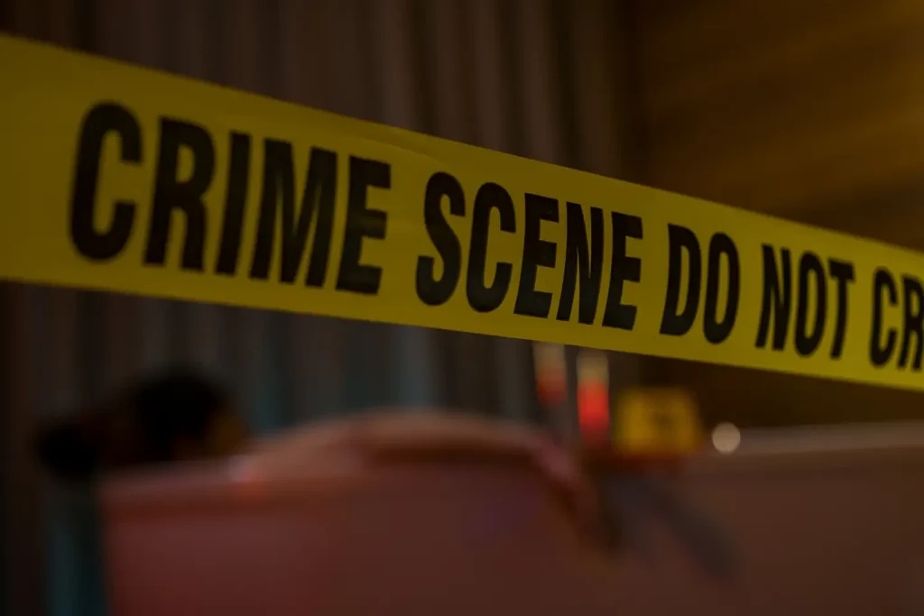 Trauma scene with equipment and safety barriers.